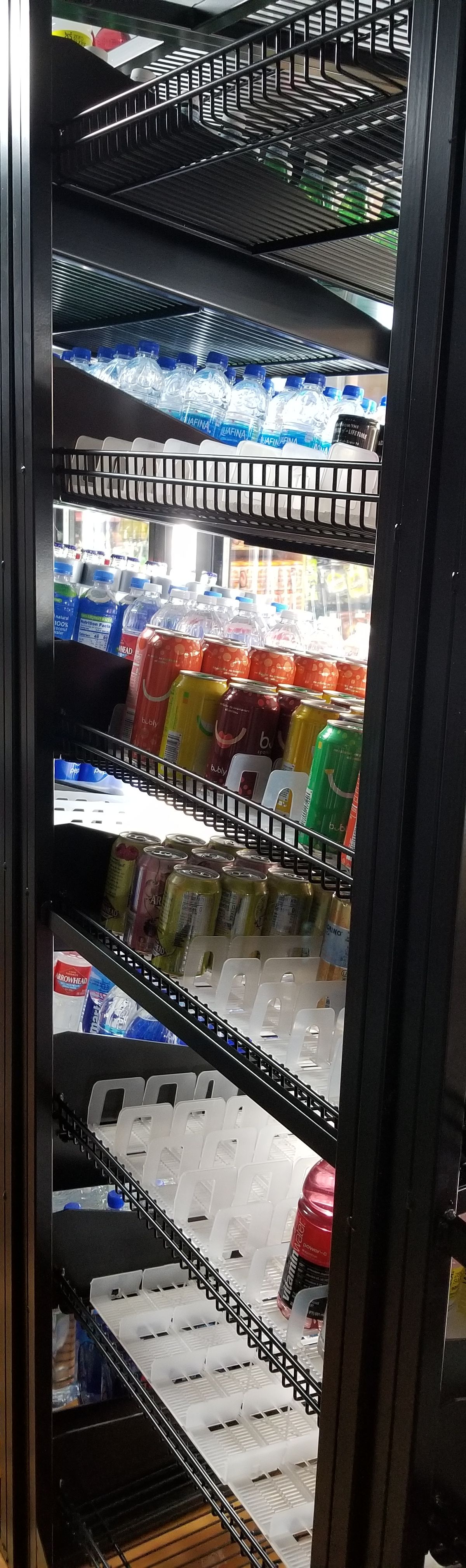 Custom cooler display shelving by Creative Display Works for Copper Stop convenience store